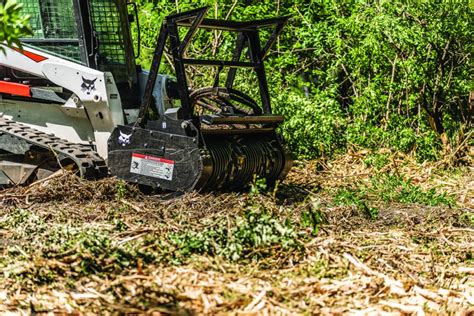 land clearing with a skid steer|bobcat attachments for clearing brush.